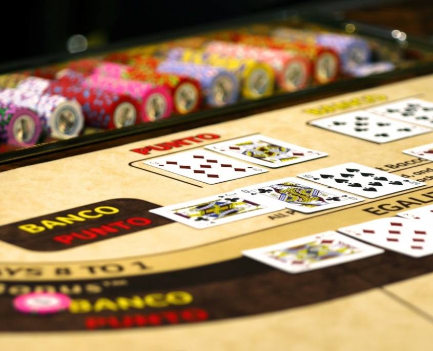 Baccarat table with cards and chips