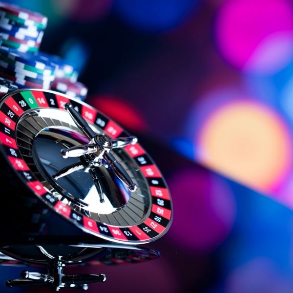 live roulette table with pojer chips in the background