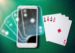 mobile casino cards on a green table